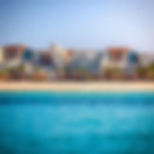 A panoramic view of Al Bateen Beach showcasing its serene shoreline and clear waters
