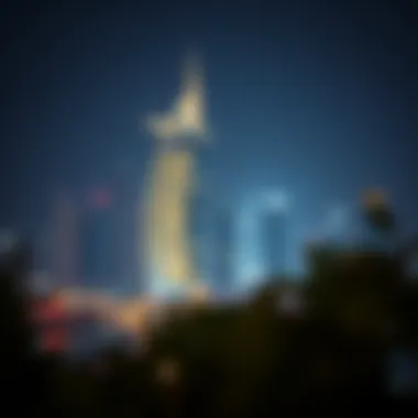 Illuminated برج النخلة at Night Evening view of برج النخلة illuminated against the Dubai skyline