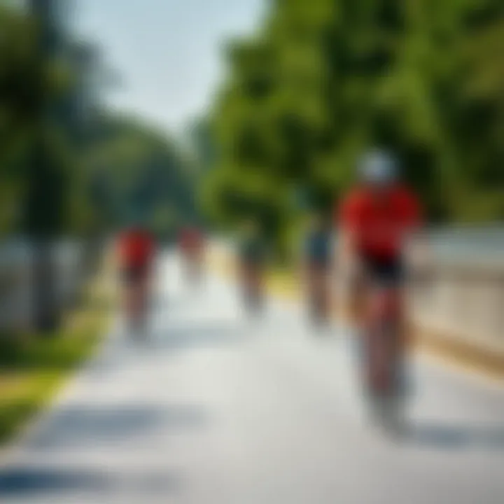 Cyclists on Hudayriat Cycling Track Cyclists enjoying a sunny day on the Hudayriat Cycling Track amidst lush greenery