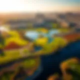 Aerial view of the Montgomerie Dubai golf course showcasing its lush greens and water features.